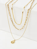 Collier chaîne doré à plusieurs rangs