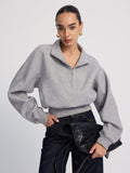 Übergroßes bauchfreies Sweatshirt mit halbem Reißverschluss