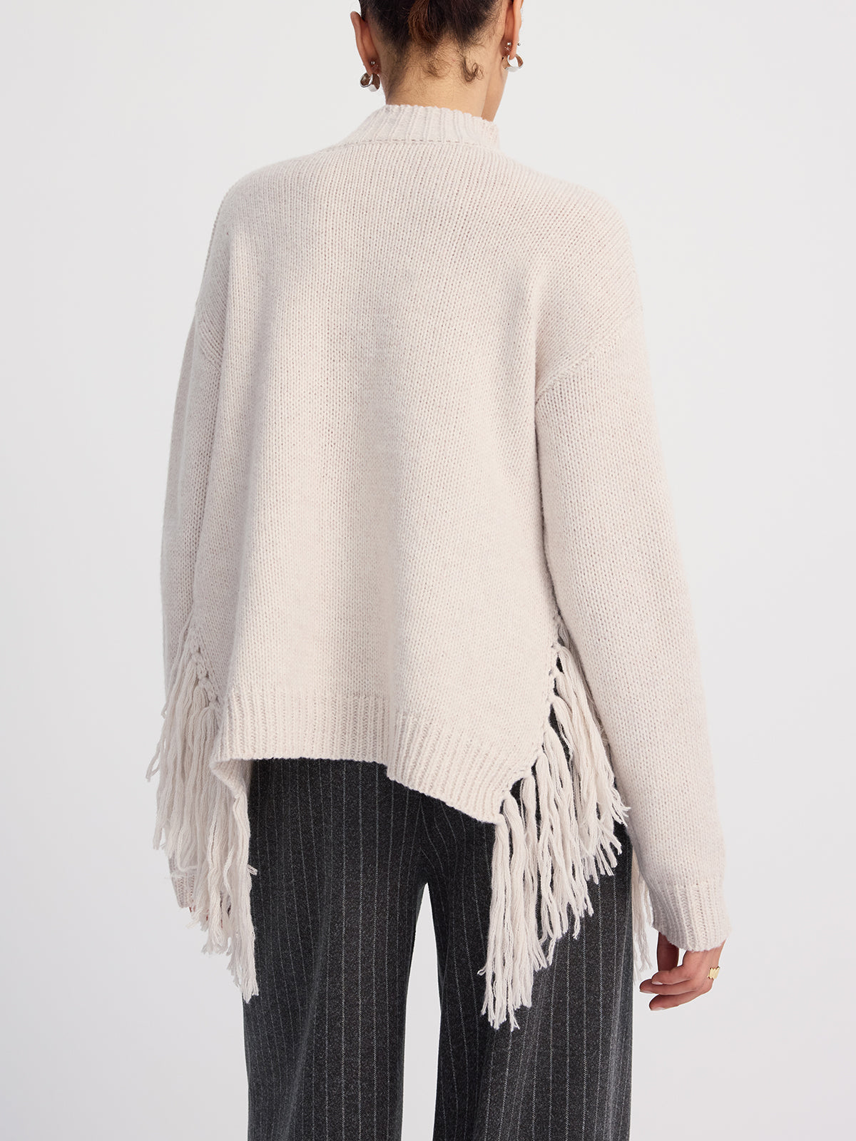 Pull oversize à col montant et franges