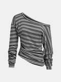 Haut asymétrique rayé avec design épaule dénudée