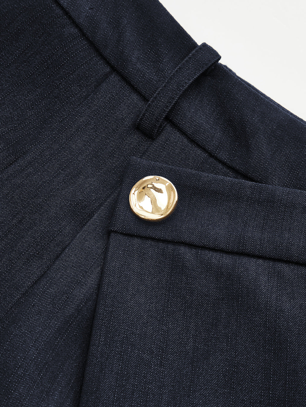 Pantalon ample à boucle asymétrique