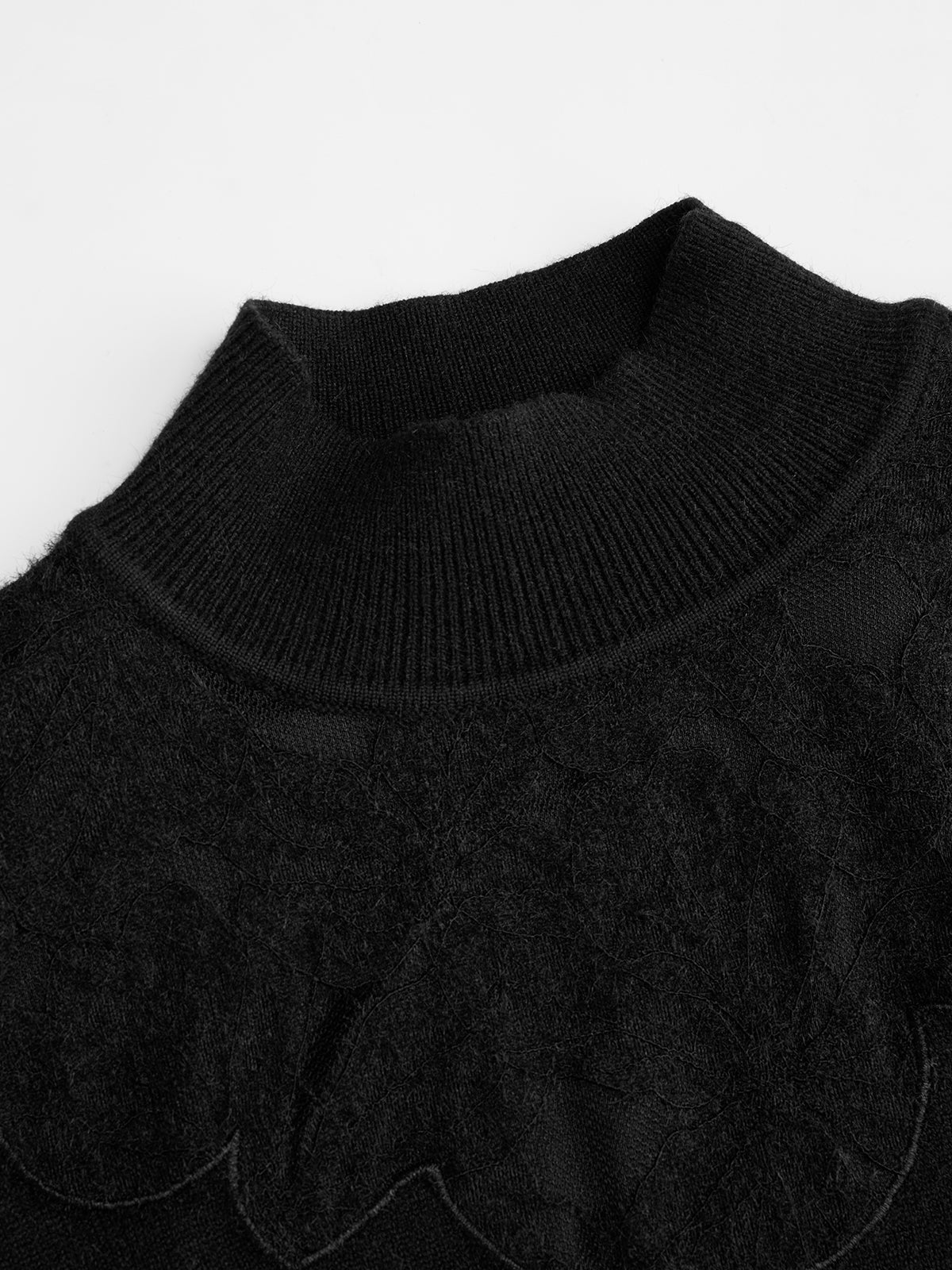 Rollkragenpullover mit Spitzeneinsatz