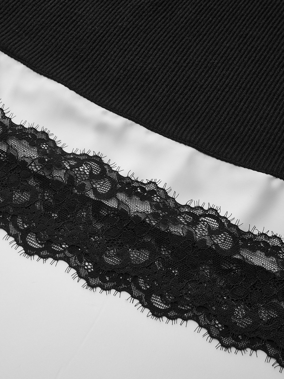 Mini-robe côtelée en mélange de laine avec dentelle et manches cloche