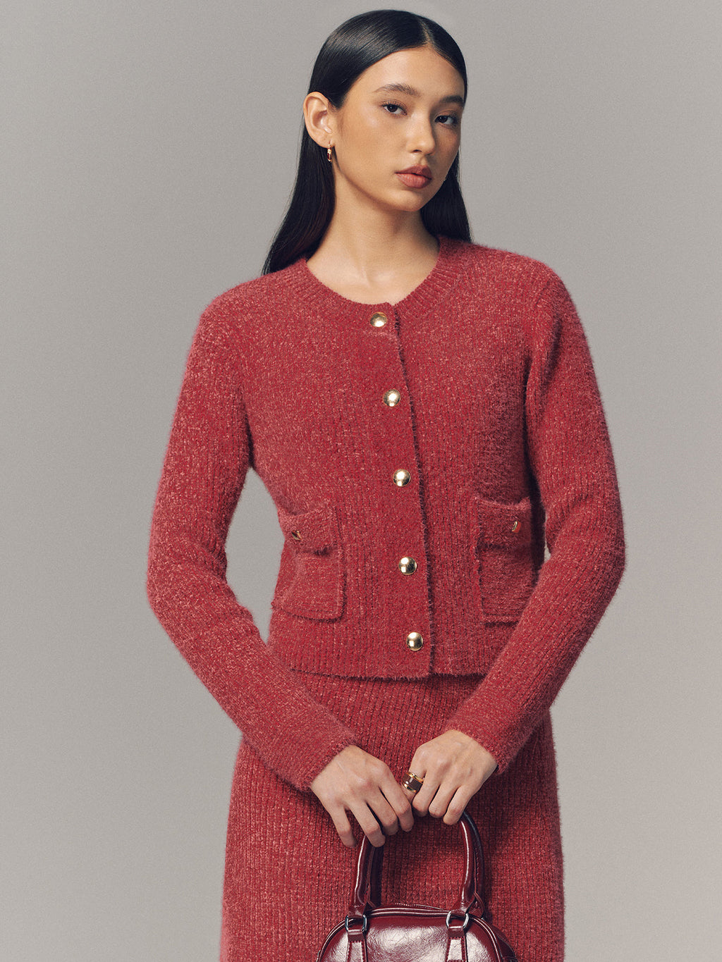 Strickjacke mit Metalldetail und Minirock-Set
