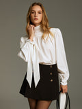 Rollkragenbluse mit Bindemanschetten