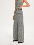 Pantalon large en tweed avec détails métalliques