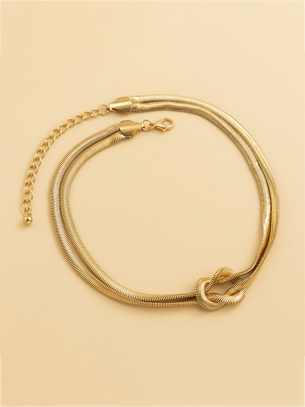 Halskette mit Doppelkette im Schlangendesign und Knotendetail