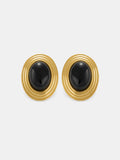 Boucles d'oreilles clous ovales en pierre noire à monture texturée