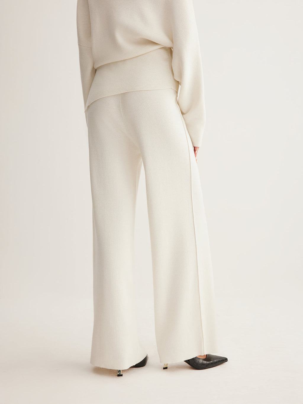 Set aus asymmetrischem Pullover aus Wollmix & weiter Hose