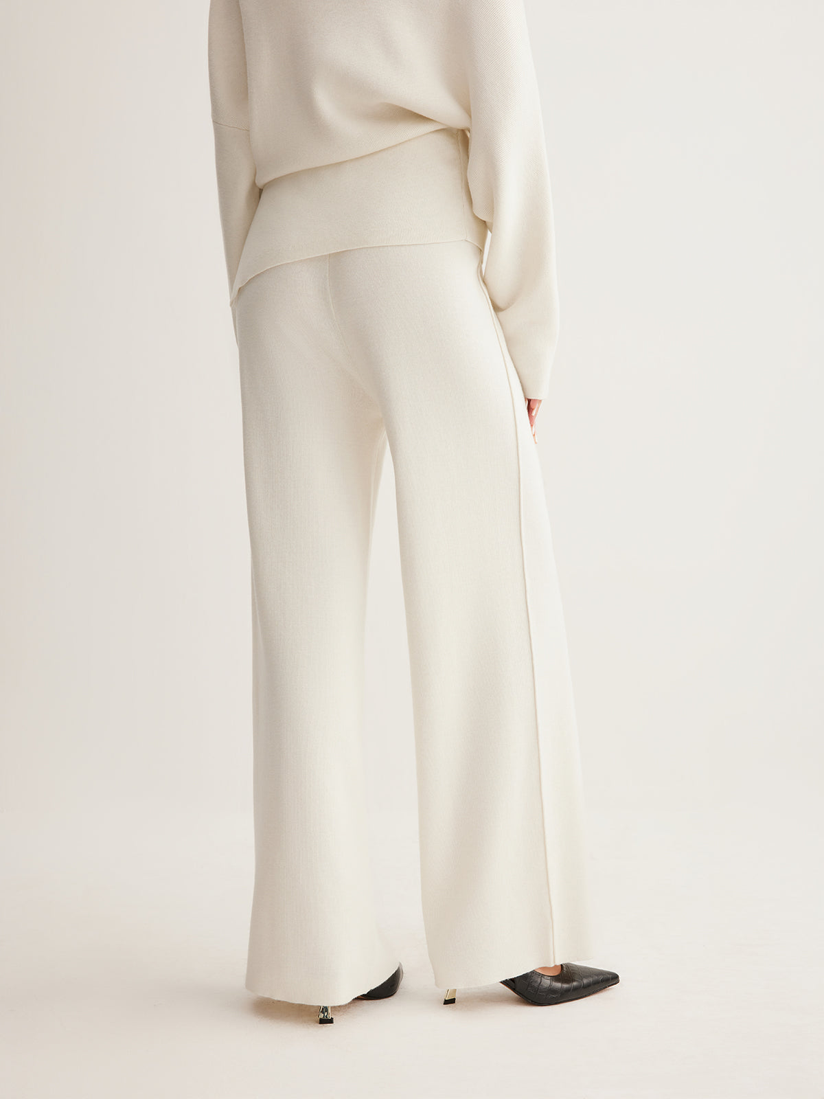 Set aus asymmetrischem Pullover aus Wollmix & weiter Hose