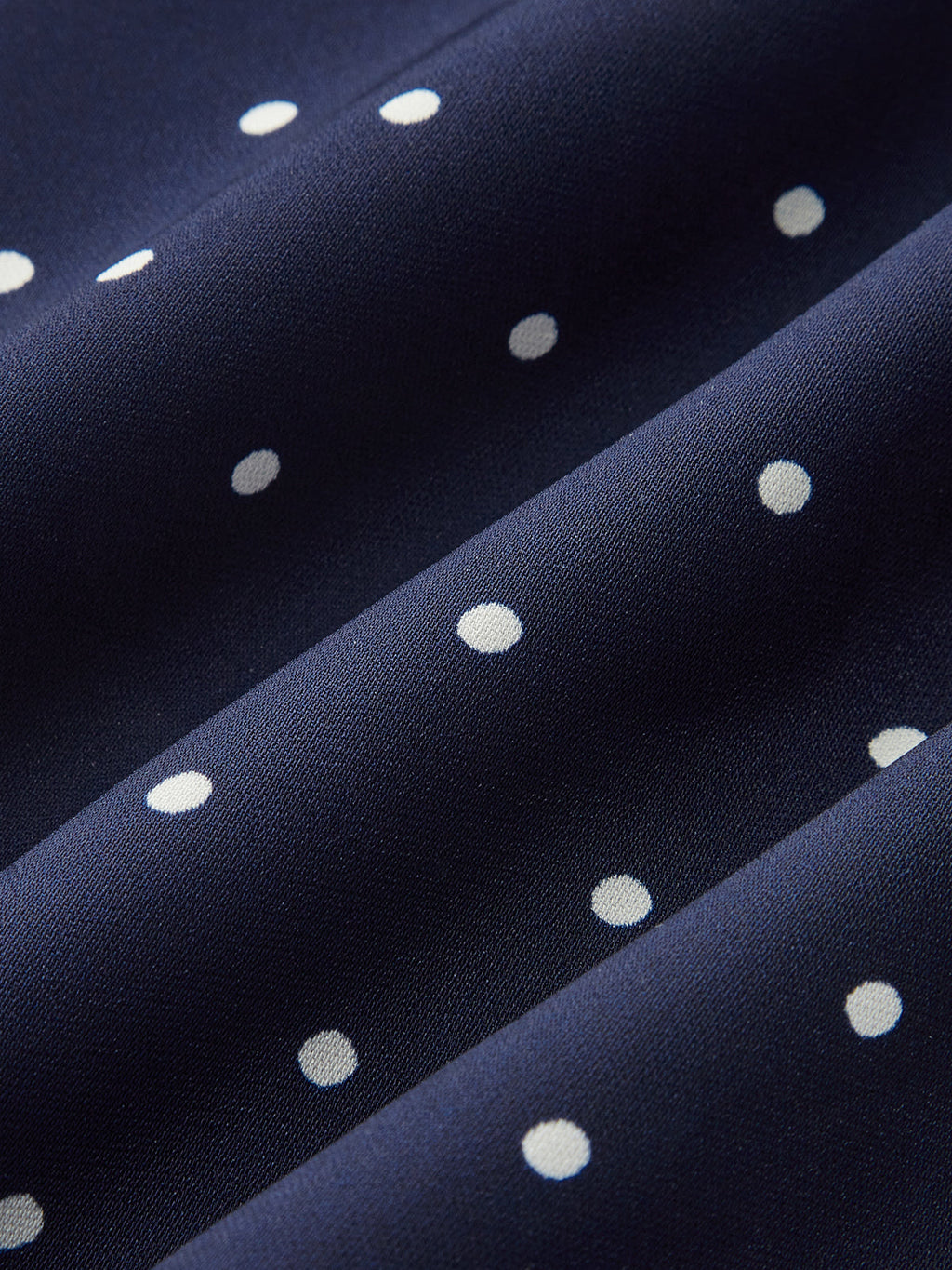 Mini-robe à pois avec encolure en trou de serrure