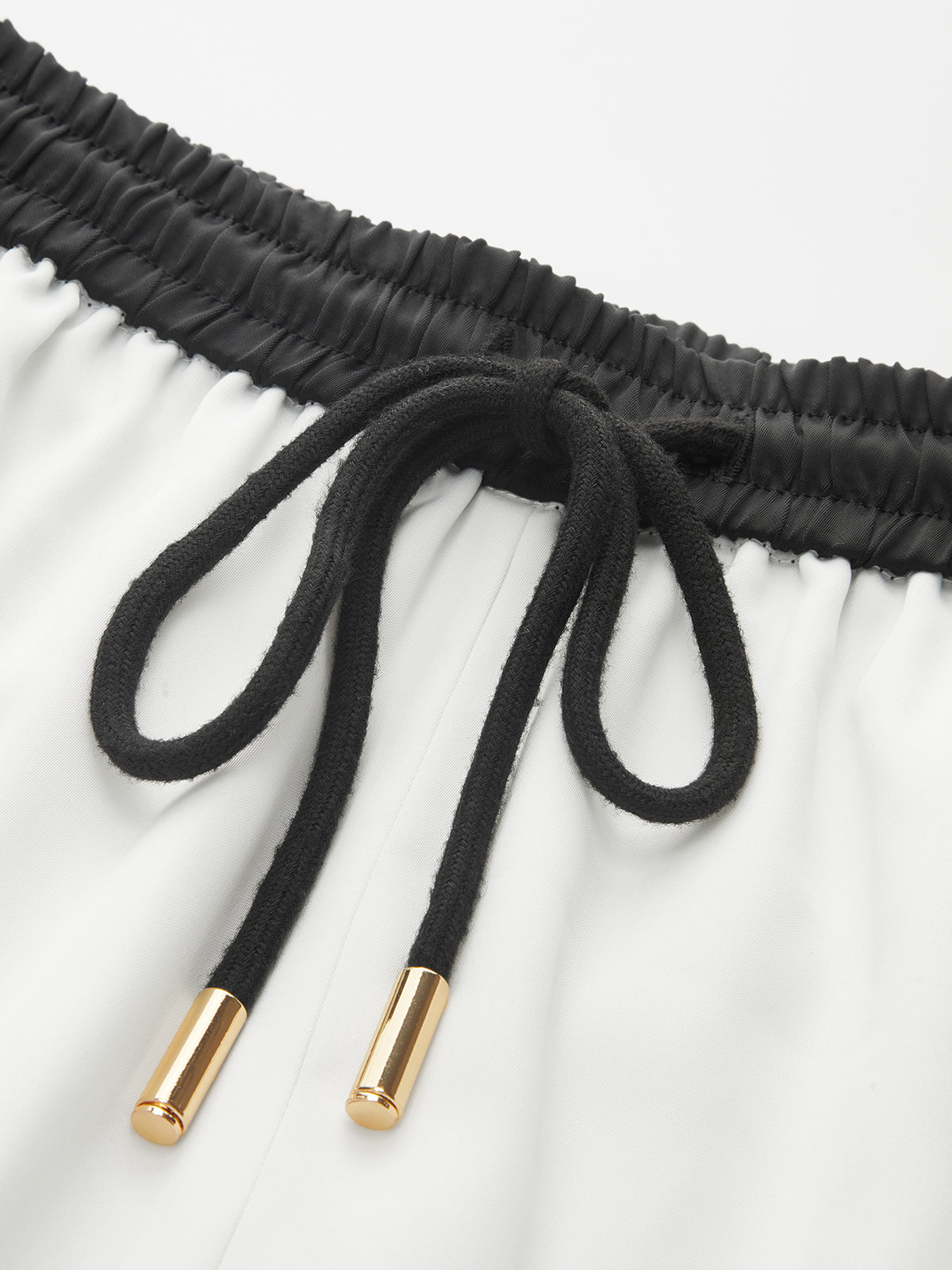 Pantalon ample à cordon de serrage et liseré rayé