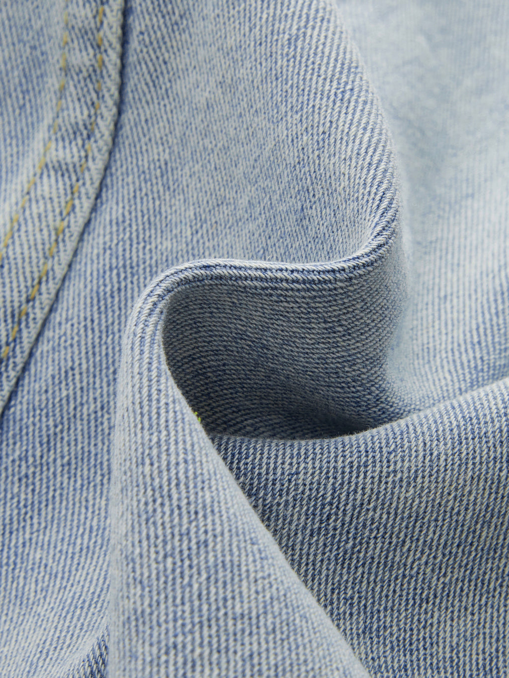 Asymmetrischer Denim-Fransen-Midirock