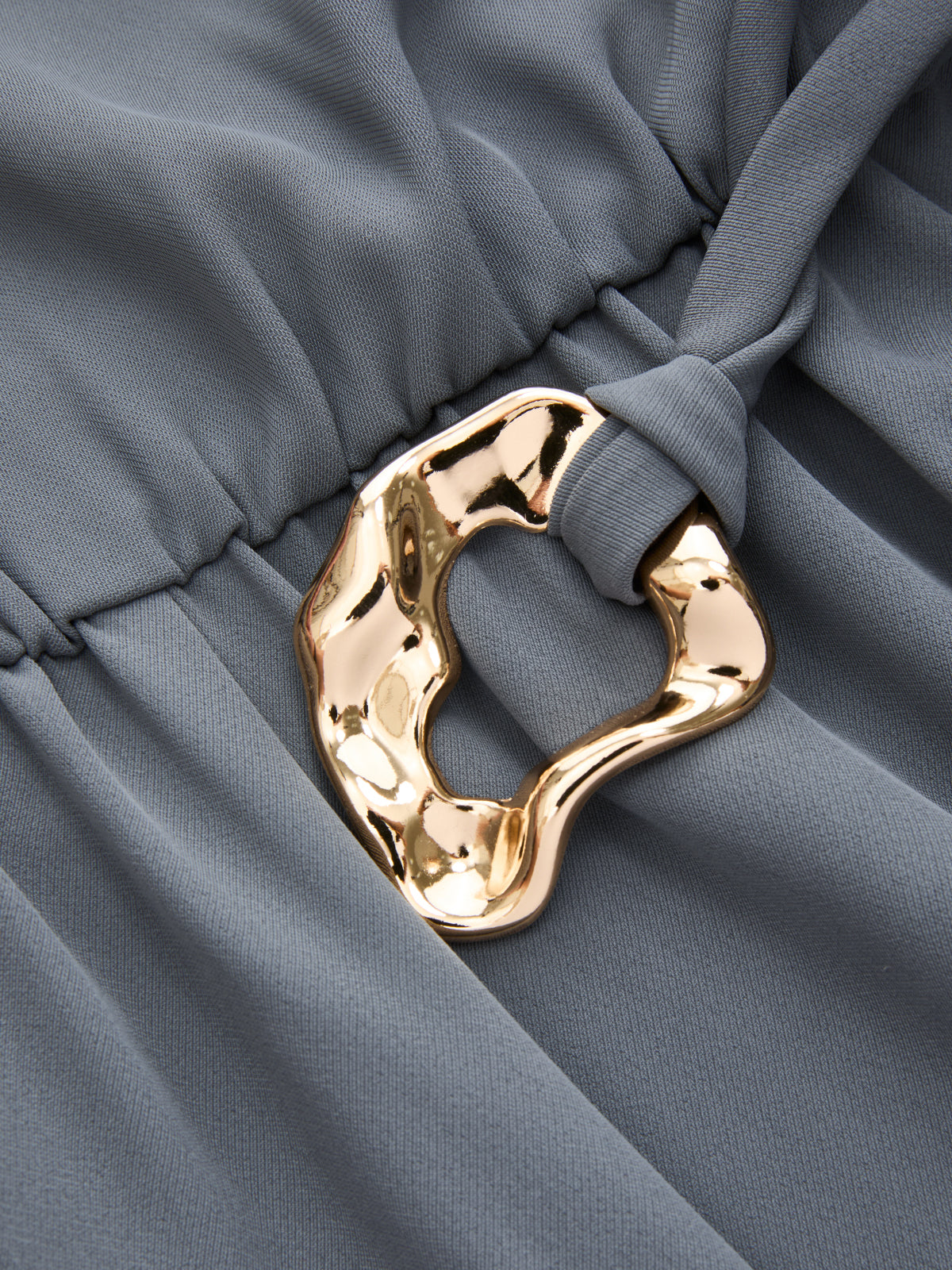 Combinaison drapée asymétrique ceinturée