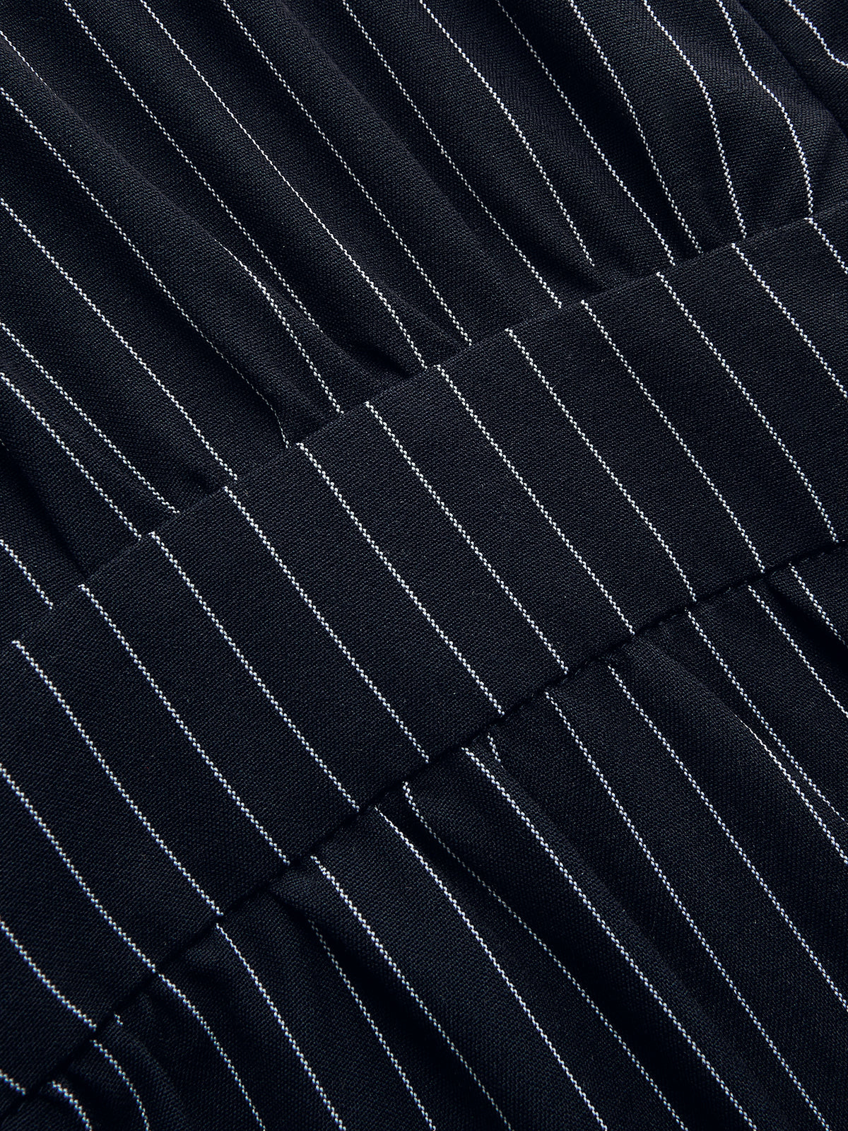 Combinaison pantalon large à rayures avec ceinture à nouer
