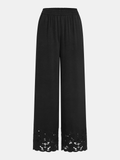 Pantalon large à taille élastique et ourlet en dentelle