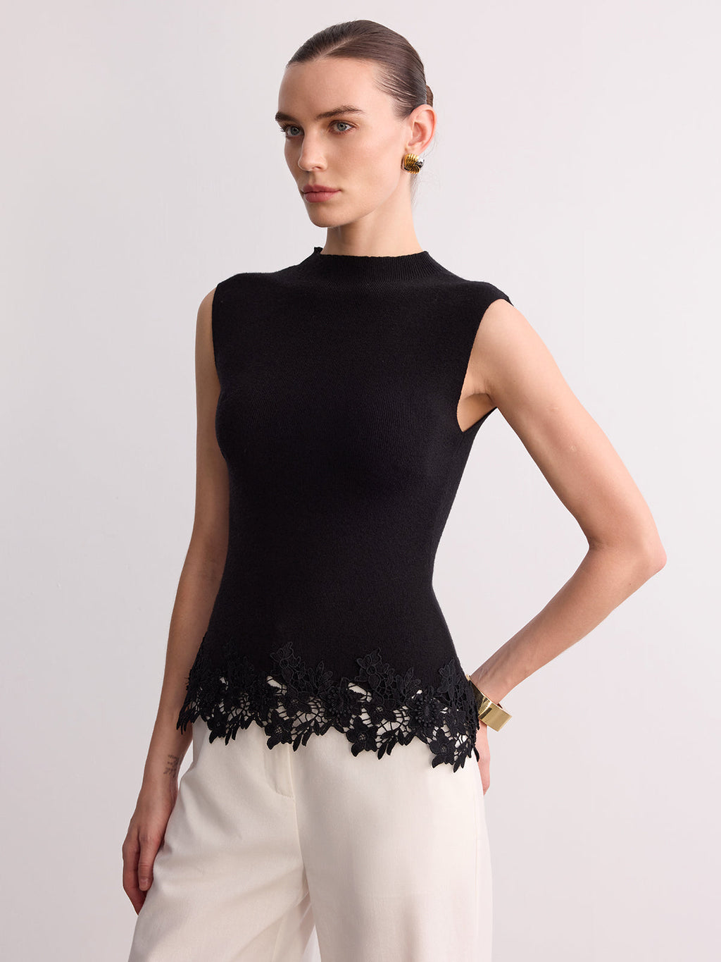 Gilet en maille sans manches avec ourlet en dentelle