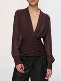 Blouse semi-transparente à col en V profond et fronces