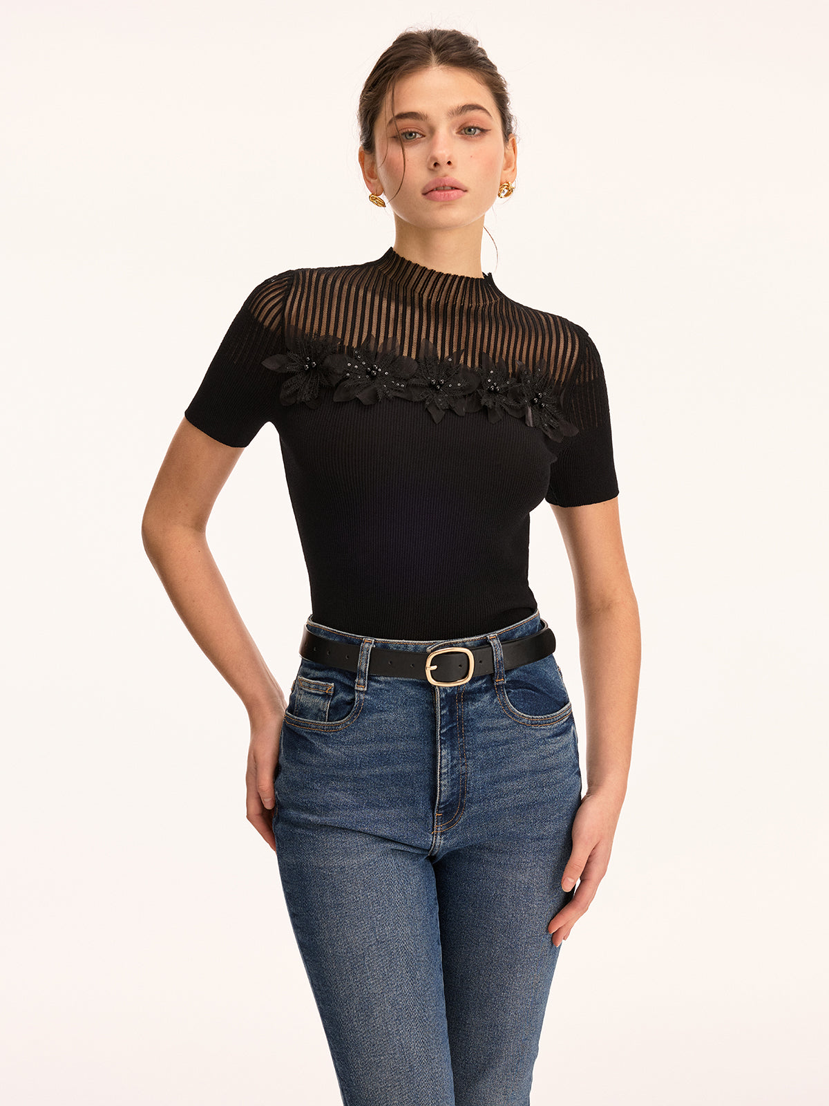 Haut en maille à col montant transparent et applique florale en 3D