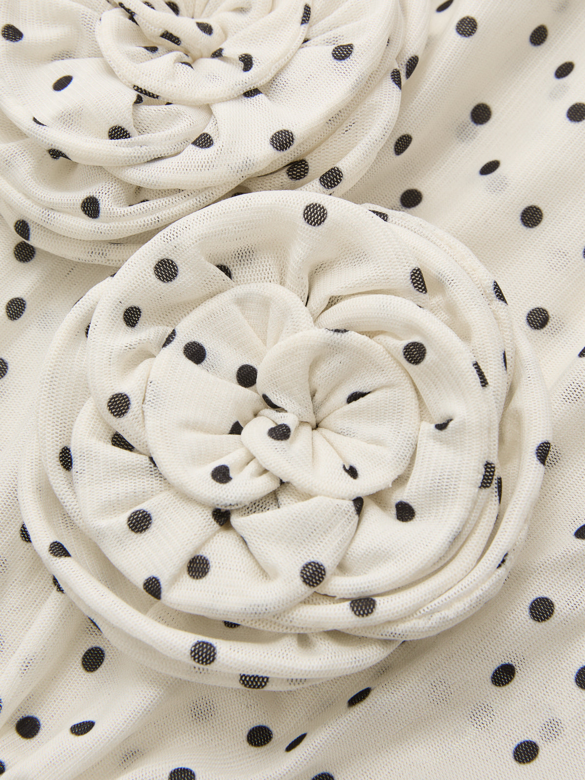 Haut à une épaule, à pois et fleurs 3D