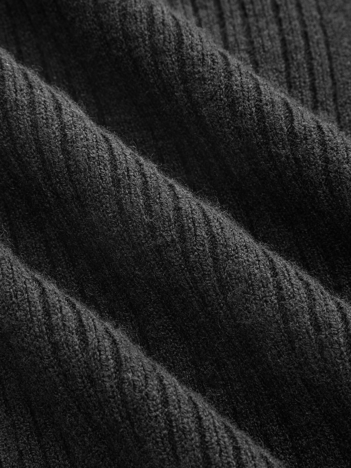 Cardigan en maille côtelée avec manches transparentes et boutons métalliques