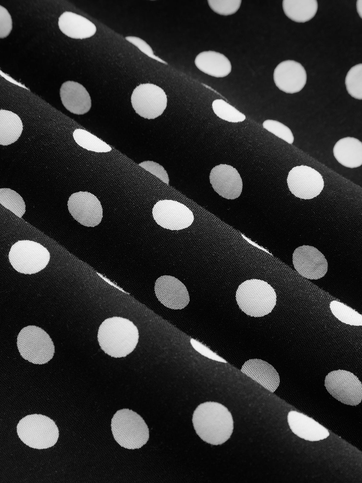Maxikleid mit V-Ausschnitt aus gepunkteter Spitze