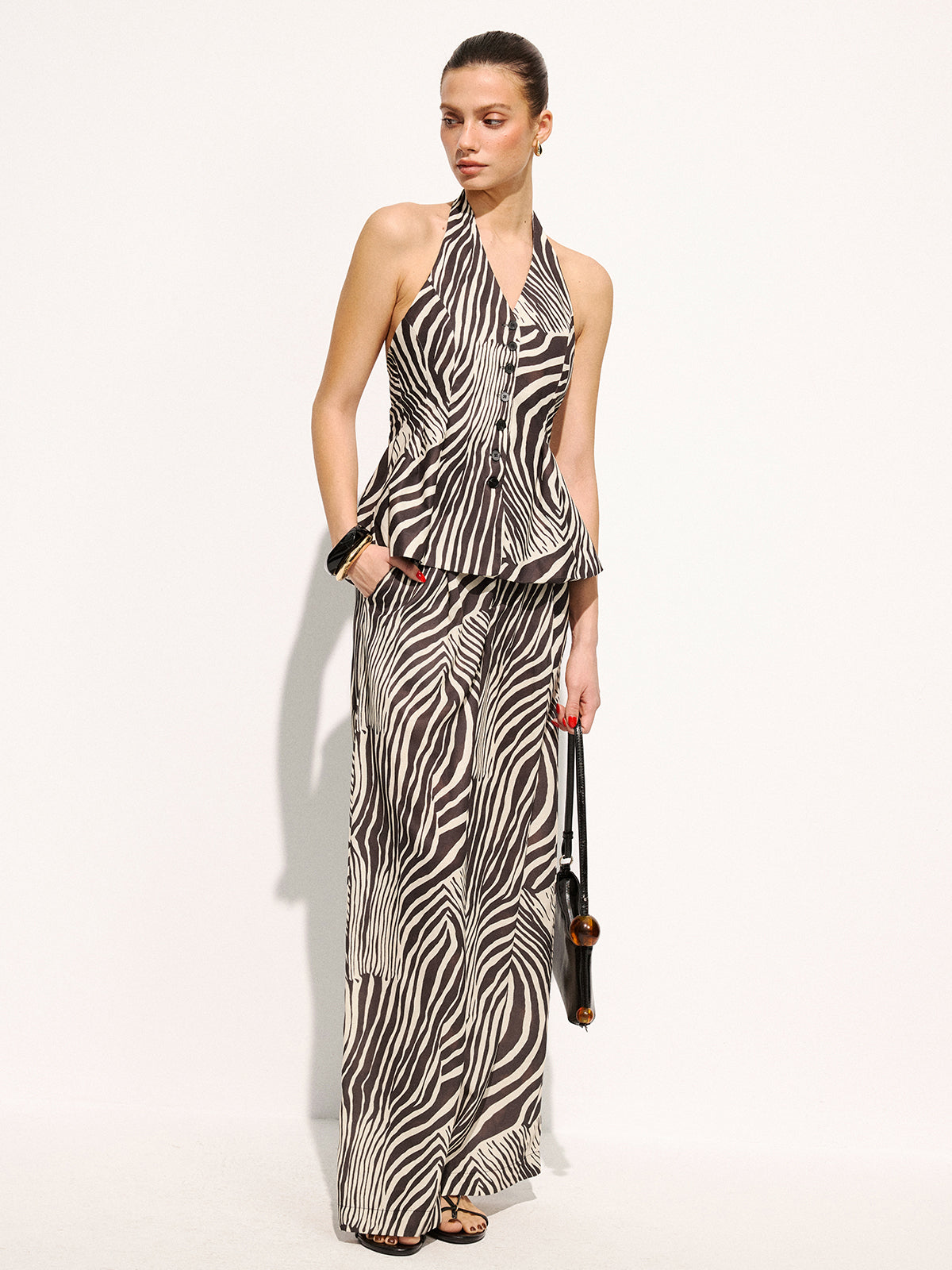 Ensemble gilet dos nu et pantalon imprimé zèbre