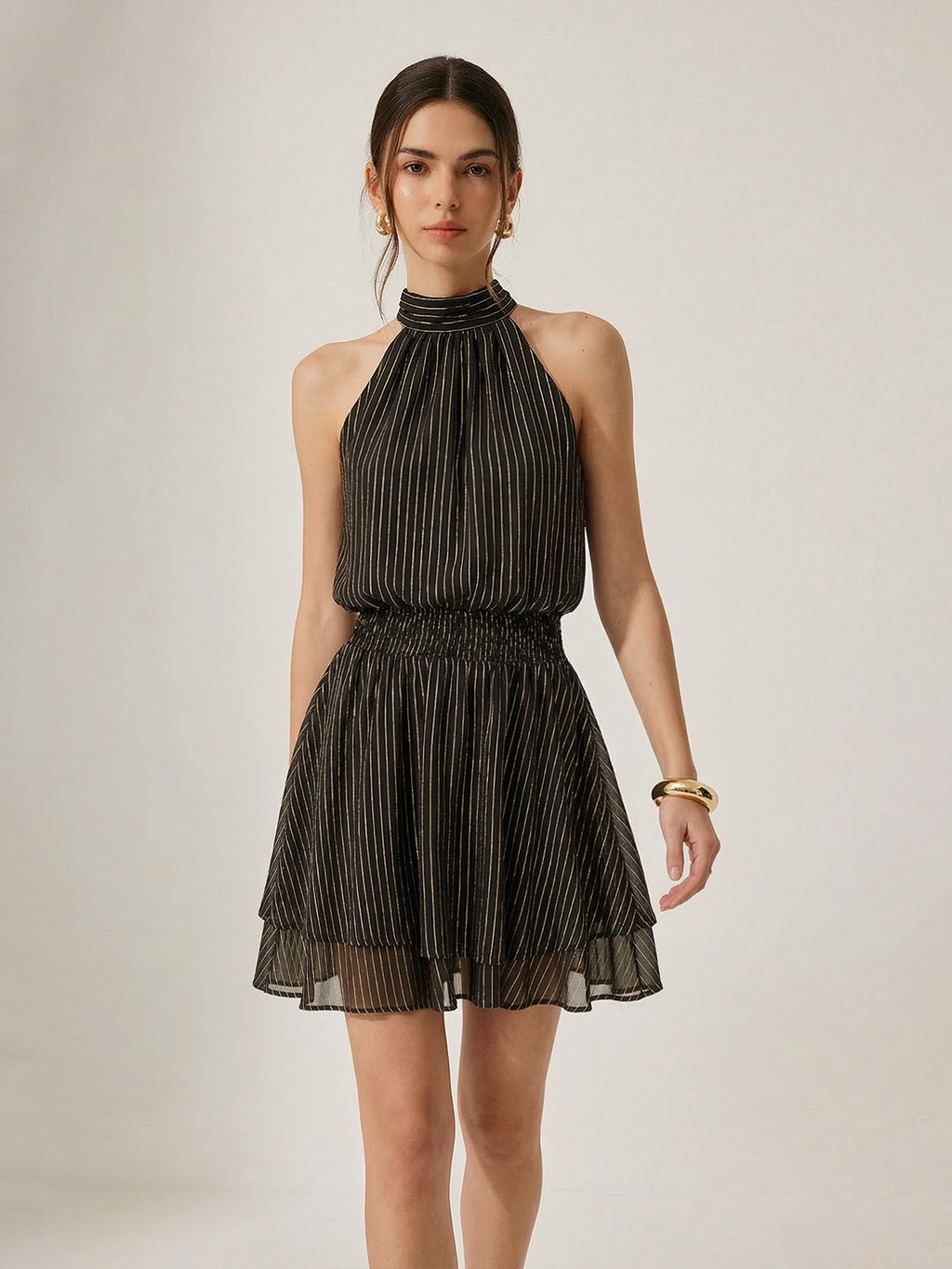 Mini-robe à rayures smockée et superposée à dos nu