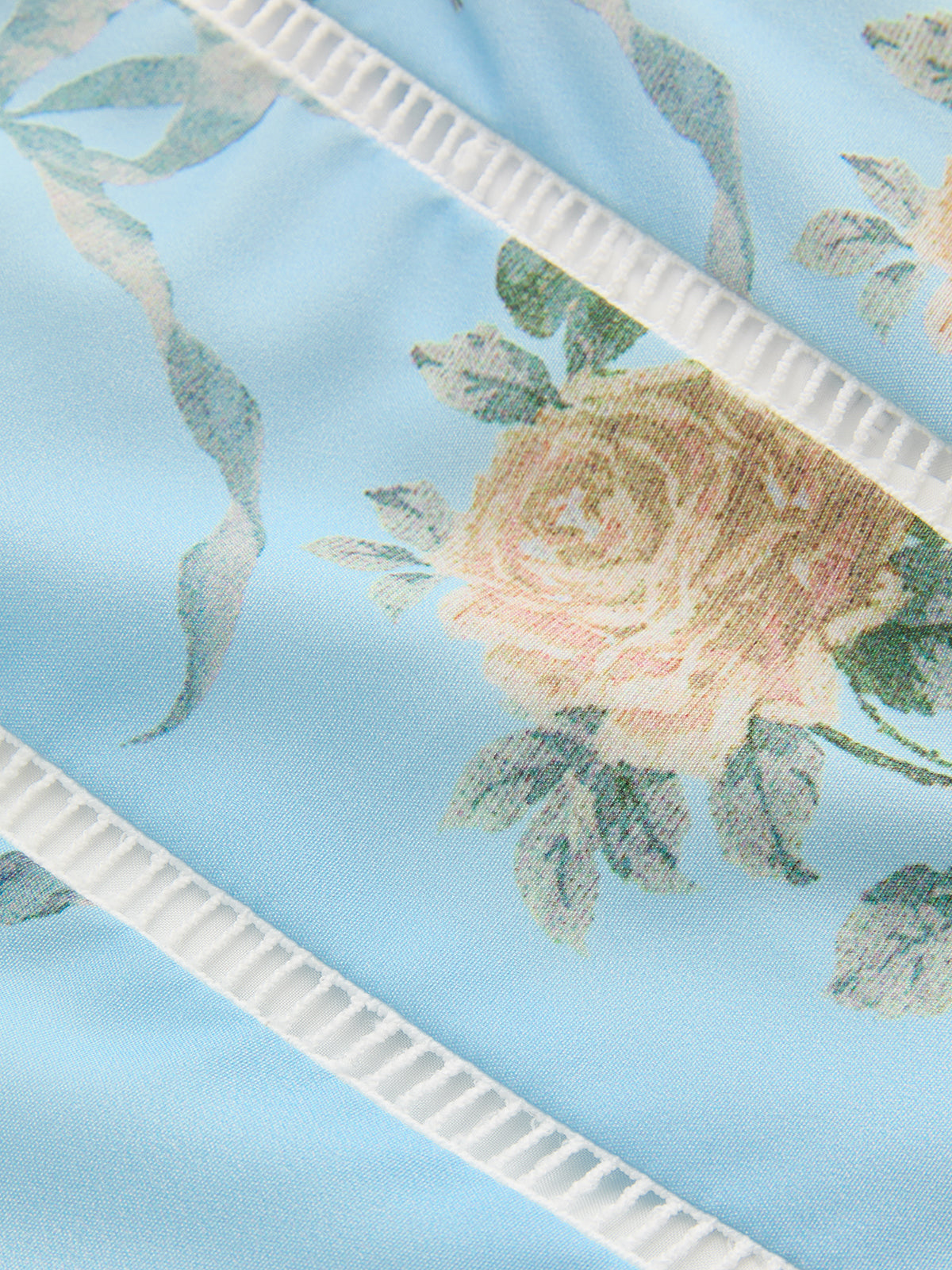 Robe midi à fines bretelles et imprimé floral