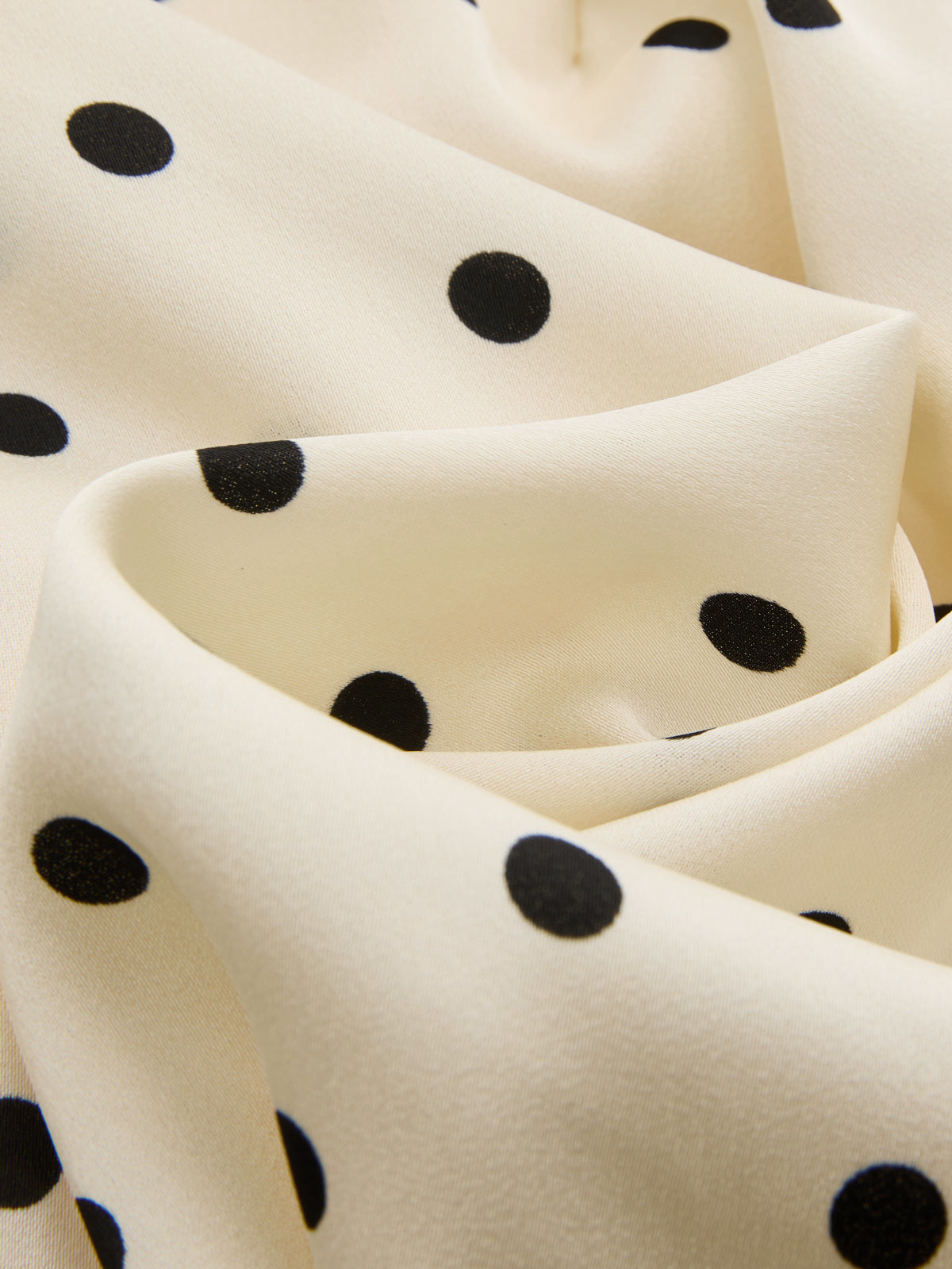 Gepunktetes ärmelloses, gerafftes Minikleid