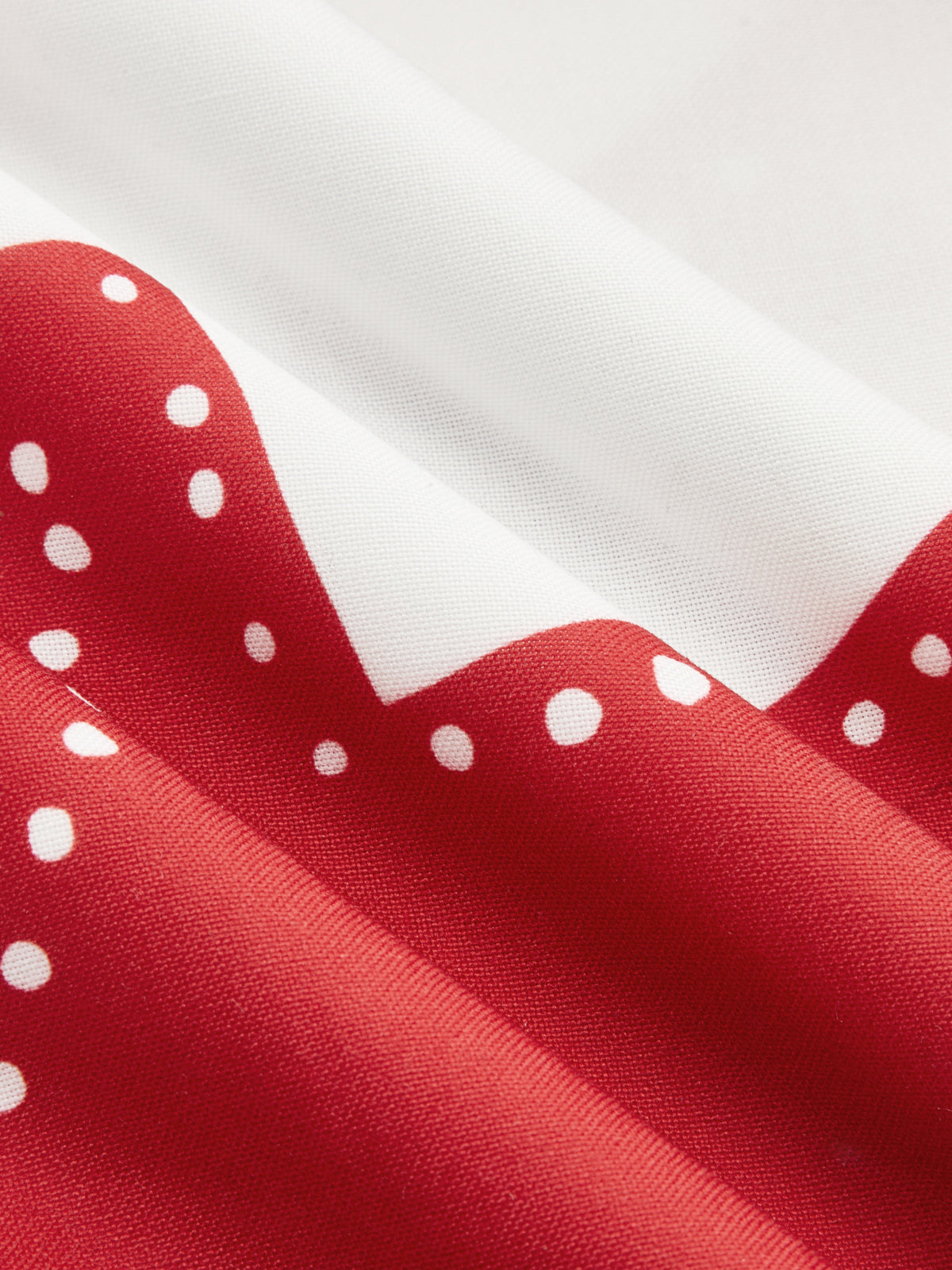 Jumpsuit mit abstraktem Blattdruck, Neckholder und Twist-Detail