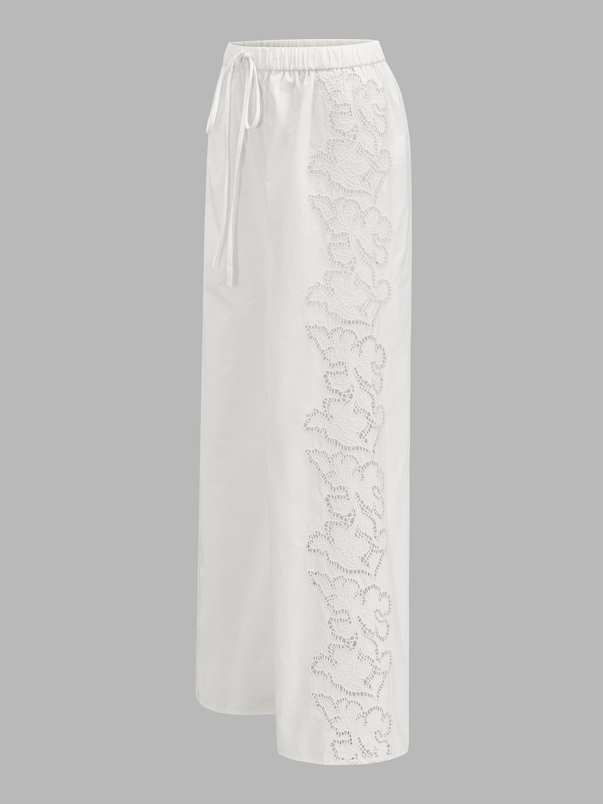 Pantalon en coton brodé à cordon de serrage et à lacets latéraux