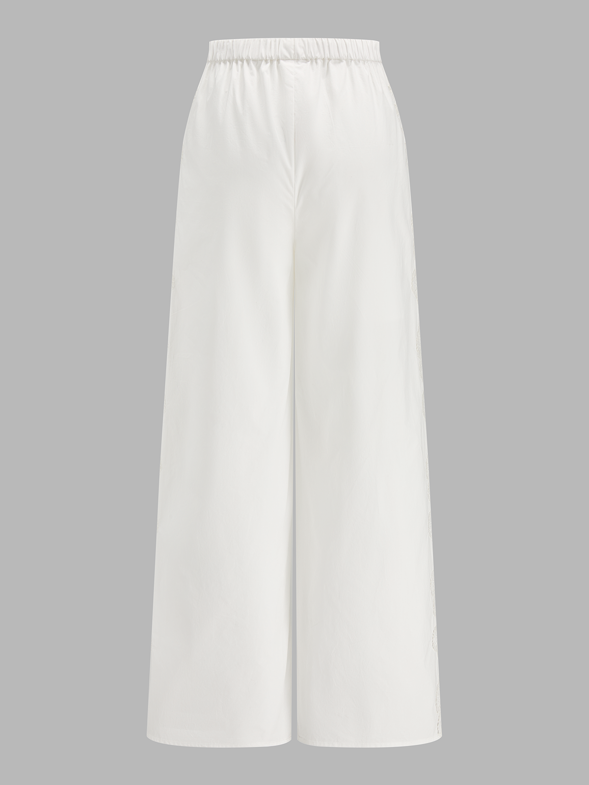 Pantalon en coton brodé à cordon de serrage et à lacets latéraux