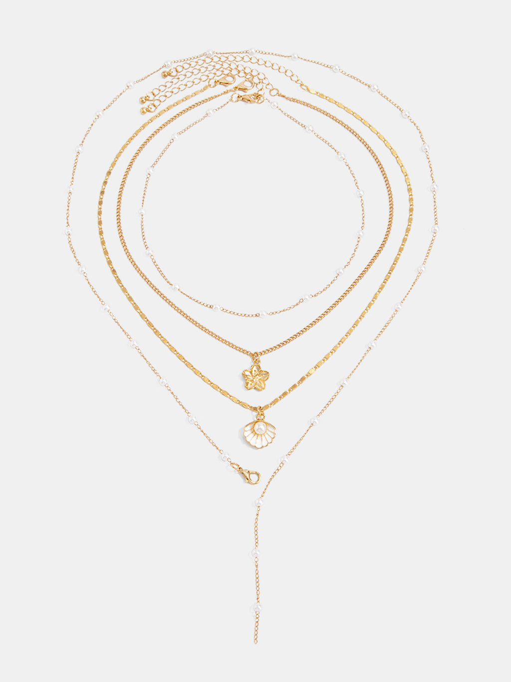 Collier superposé de fleurs et de coquillages en perles