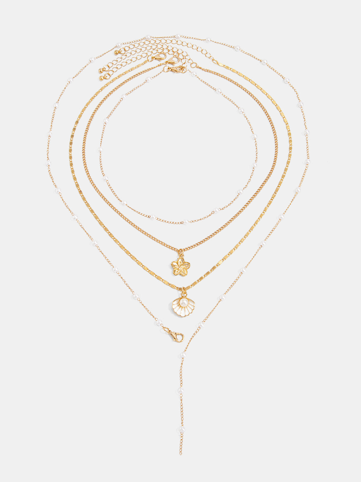 Collier superposé de fleurs et de coquillages en perles