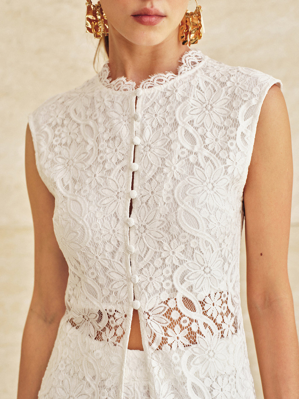 Haut long sans manches en dentelle