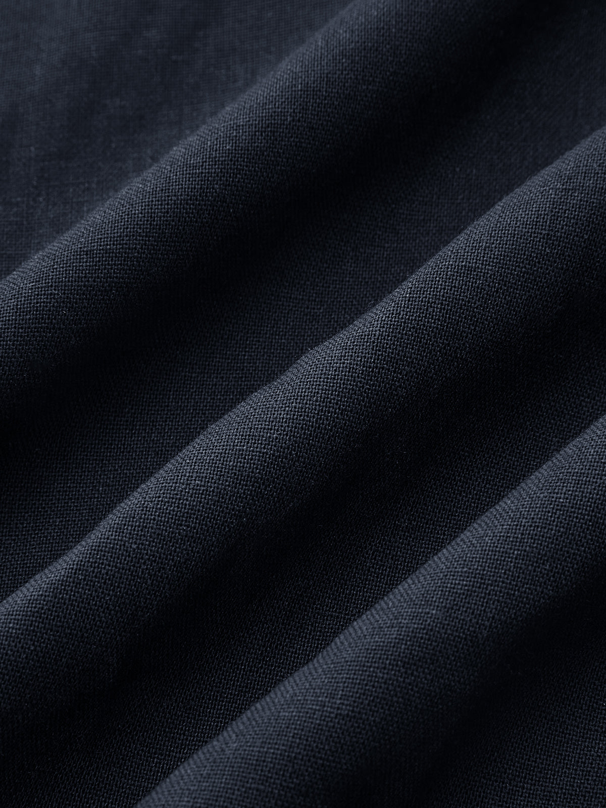 Mini-robe sans manches cache-cœur en mélange de lin ceinturée