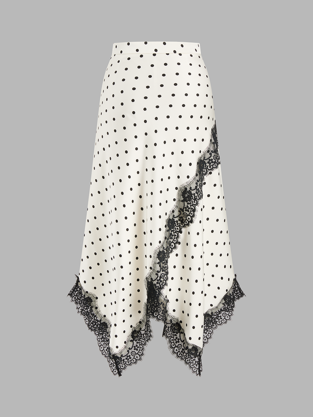 Jupe midi asymétrique en dentelle à pois
