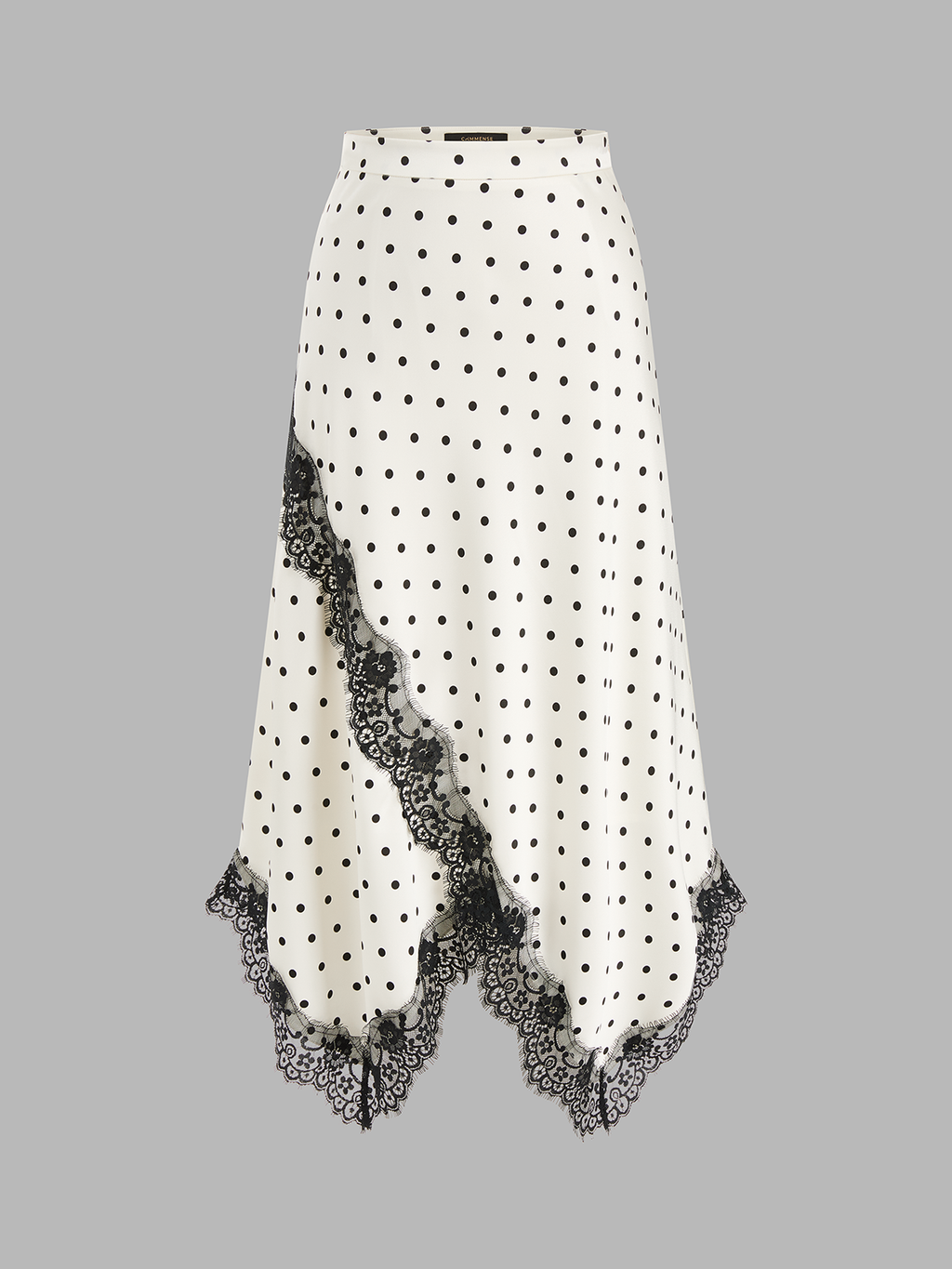 Jupe midi asymétrique en dentelle à pois