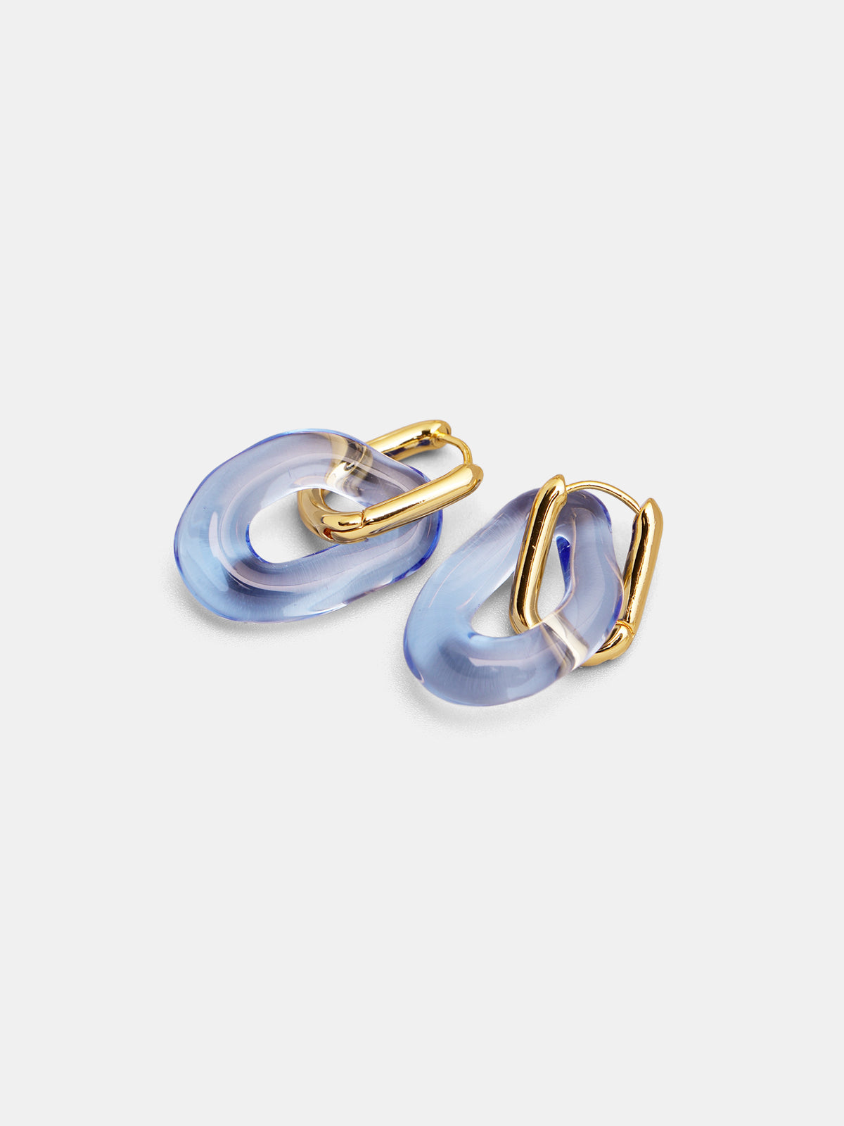 Boucles d'oreilles créoles maillons dorés en verre transparent