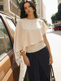 Asymmetrische Satinbluse mit Drapierung