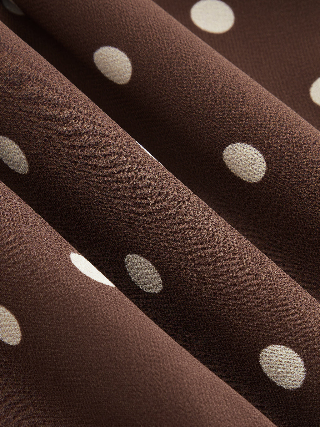 Ensemble haut transparent à pois bordé de dentelle et mini-jupe