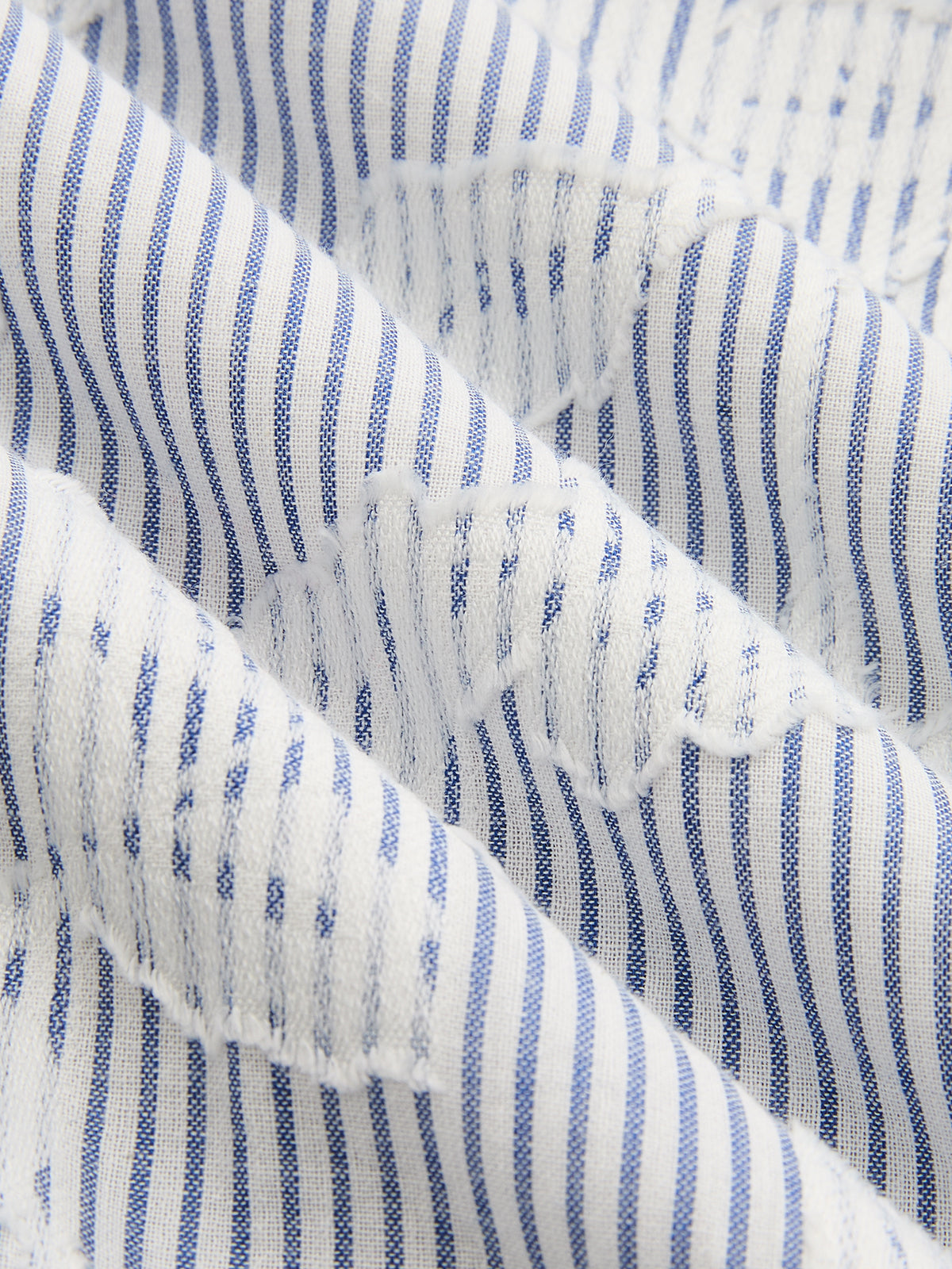 Robe longue asymétrique brodée de fleurs et rayée