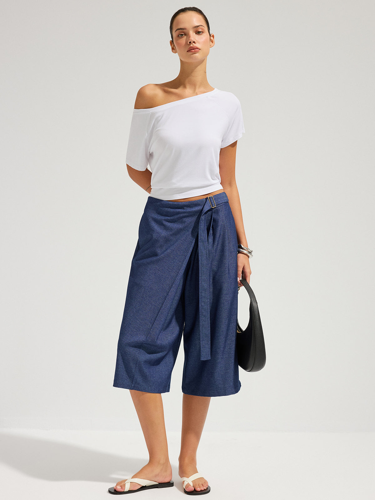 Pantalon Capri coupe ample, portefeuille et ceinturé