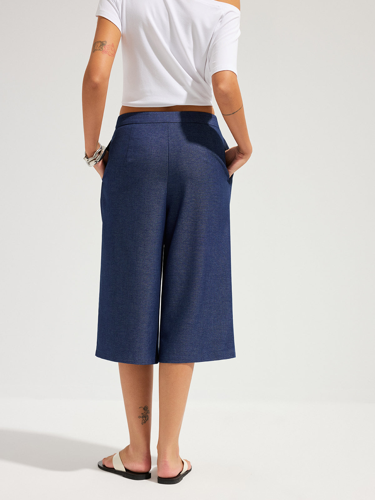 Pantalon Capri coupe ample, portefeuille et ceinturé