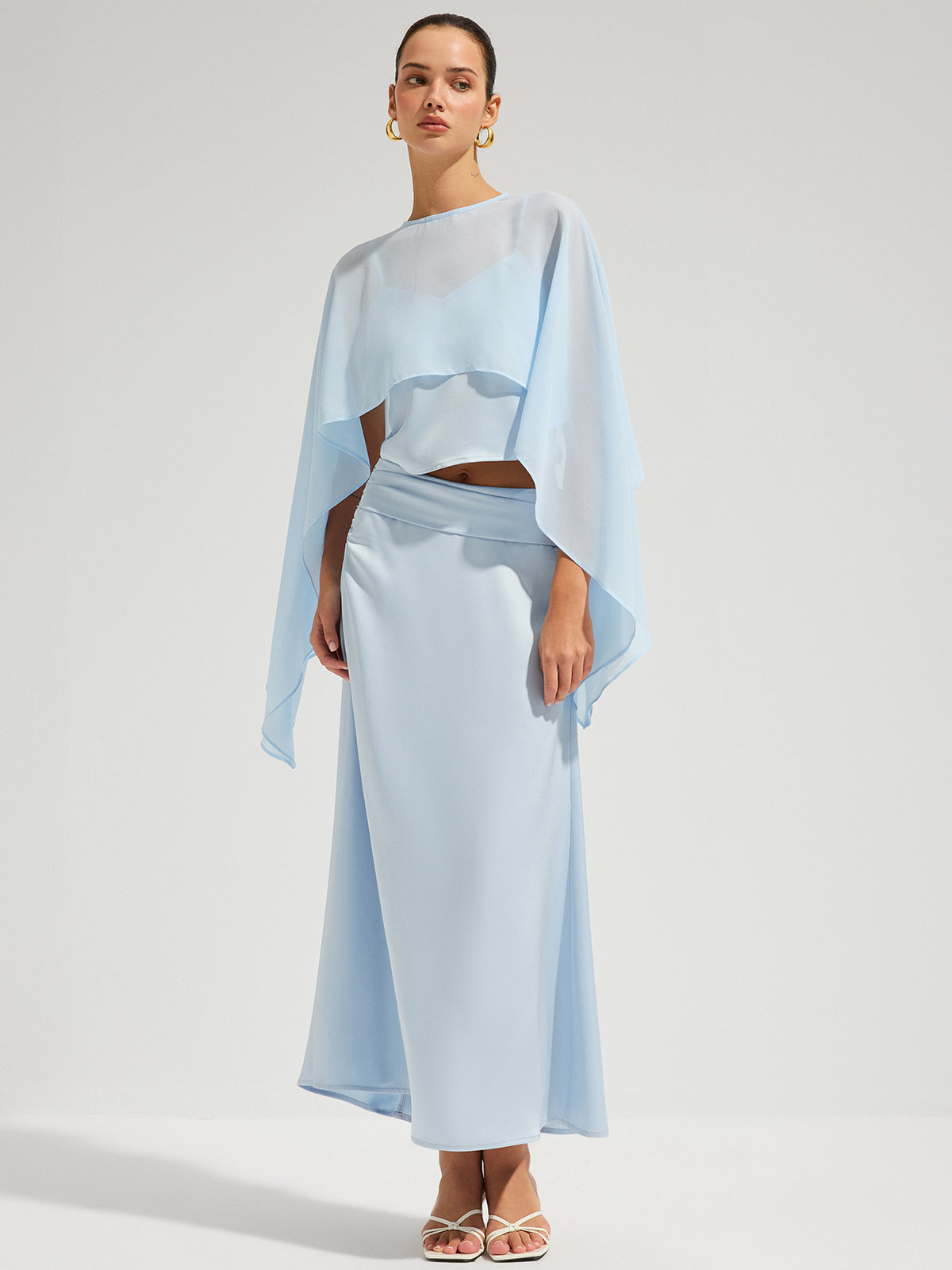 Set aus transparentem Cape-Oberteil und Satin-Maxirock