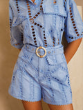 Shorts brodés à œillets taille mi-haute et ceinture