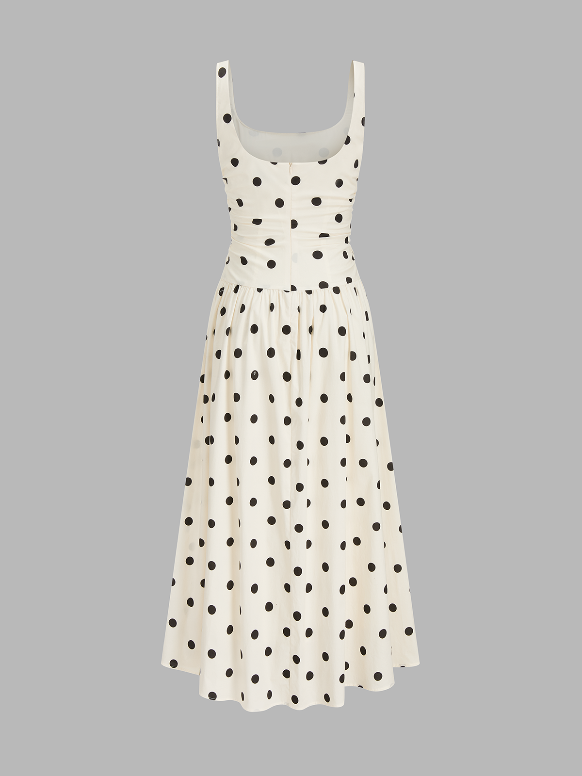Robe longue à fines bretelles et fronces à pois