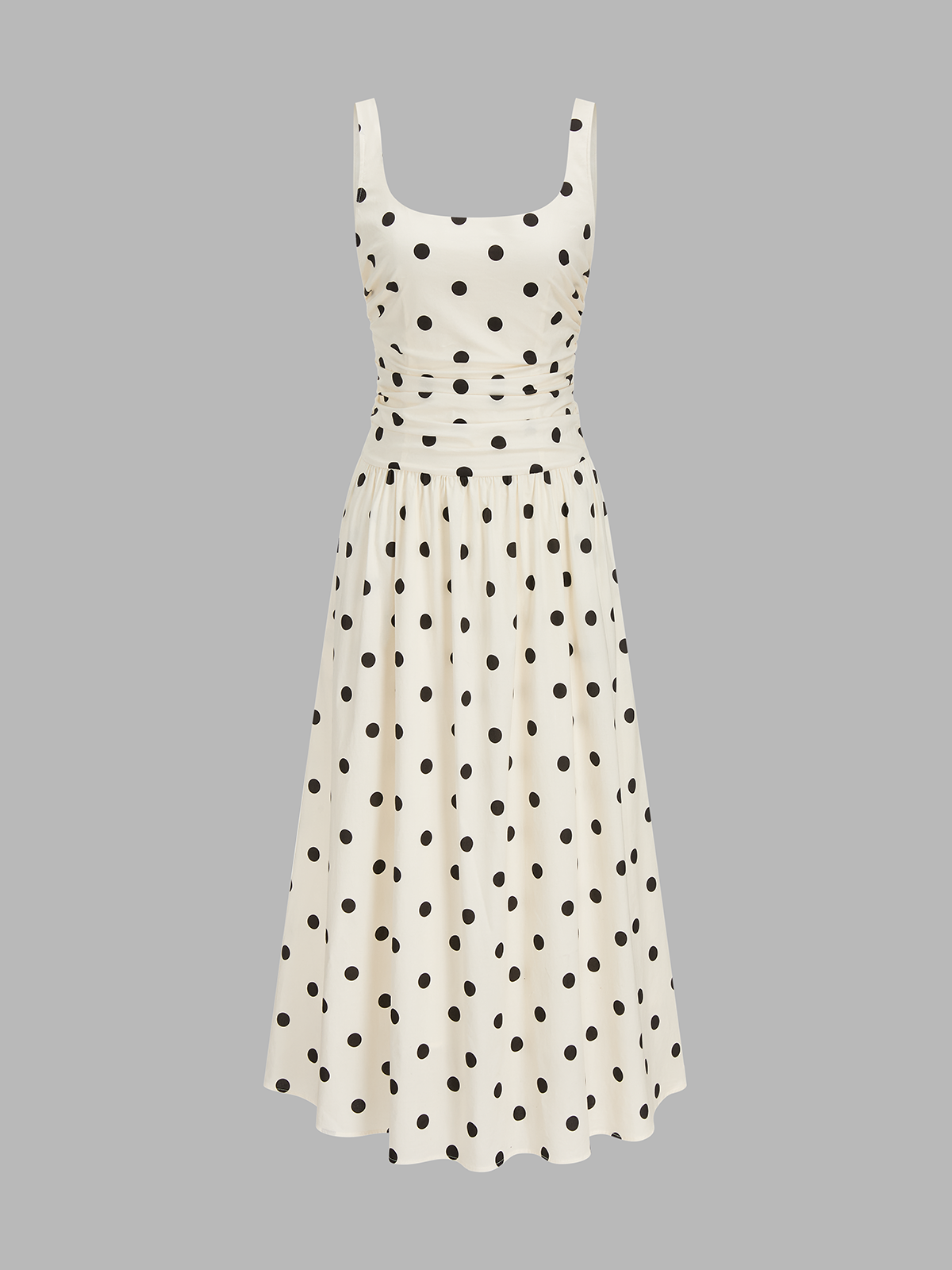 Robe longue à fines bretelles et fronces à pois