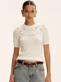 Haut en tricot ajouré à manches courtes au crochet